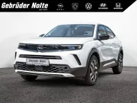 Gebraucht Opel Mokka-e Elegance 100 kW (136 PS) 2024 Weiss / banquise weiss SUV