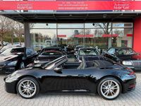 Gebraucht Porsche 911 Carrera 4 Cabriolet 385 PS (283 kW) 2023 Tiefschwarz Cabrio