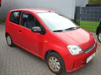Gebraucht Daihatsu Cuore 58 PS (42 kW) 2005 Rot Kleinwagen