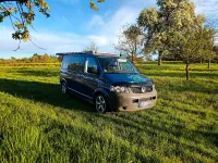 Second-hand VW Caravelle 131 CP (96 kW) 2009 Albastru Van