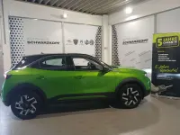 Gebraucht Opel Mokka-e Elegance 100 kW (136 PS) 2023 Matcha green/ikone gruen SUV