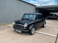 Second-hand Mini 1000 41 CP (30 kW) 1990 Negru Hatchback