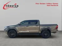 Gebraucht Toyota HiLux Basis 204 PS (150 kW) 2025 Manganbronze metallic Pickup