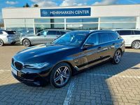 Gebraucht BMW 530e 184 PS (135 kW) 2022 Black sapphire metallic (metallic) Kombi