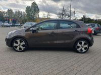 Gebraucht Kia Rio 109 PS (80 kW) 2013 Braun Limousine