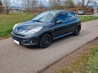 Gebraucht Peugeot 206+ 73 PS (53 kW) 2011 Grau Kleinwagen