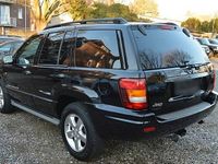 Gebraucht Jeep Grand Cherokee Overland 163 PS (119 kW) 2004 Schwarz SUV