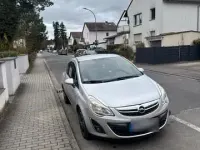 Gebraucht Opel Corsa 87 PS (63 kW) 2012 Silber Kleinwagen