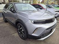 Gebraucht Opel Mokka-e Elegance 100 kW (136 PS) 2022 Quarz silber SUV
