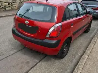 Używany Kia Rio 94 KM (69 kW) 2009 Czerwony Hatchback