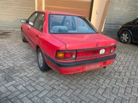 Gebraucht Mazda 323 88 PS (64 kW) 1991 Rot Limousine