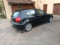 Second-hand BMW 116 122 CP (89 kW) 2011 Negru Hatchback