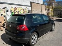 Second-hand VW Golf V 105 CP (77 kW) 2004 Negru Hatchback