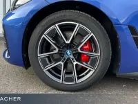 Gebraucht BMW i4 Performance 350 kW (476 PS) 2023 M portimao blau metallic Limousine