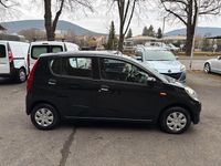 Gebraucht Daihatsu Cuore 69 PS (50 kW) 2011 Schwarz Kleinwagen