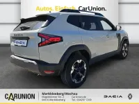 Używany Dacia Duster Extreme 141 KM (103 kW) 2025 Beżowy SUV