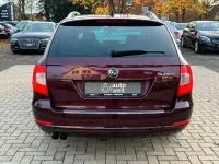 Używany Skoda Superb 140 KM (102 kW) 2012 Czerwony Kombi