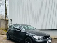 Gebraucht BMW 116 122 PS (89 kW) 2008 Schwarz Kleinwagen