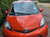 Gebraucht Toyota Aygo 69 PS (50 kW) 2012 Orange Kleinwagen