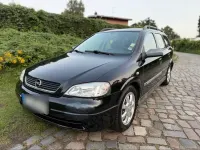 Używany Opel Astra Njoy 101 KM (74 kW) 2003 Czarny Sedan/Limuzyna