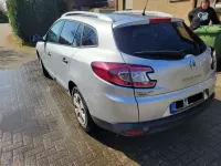 Używany Renault Mégane Dynamique 106 KM (77 kW) 2011 Srebrny Sedan/Limuzyna