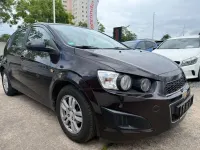Usado Chevrolet Aveo LT 101 HP (74 kW) 2013 Castanho Citadino