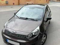 Gebraucht Kia Rio 84 PS (61 kW) 2012 Braun Kleinwagen