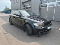 Gebraucht BMW 116 122 PS (89 kW) 2009 Schwarz Kleinwagen