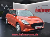 Neu Suzuki Swift Club 83 PS (61 kW) 2025 Orange Limousine