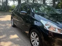 Gebraucht Peugeot 208 Active 68 PS (50 kW) 2013 Schwarz Kleinwagen