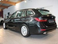 Gebraucht BMW 320e Advantage 163 PS (119 kW) 2021 Schwarz Kombi