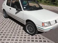 Gebraucht Peugeot 205 75 PS (55 kW) 1991 Weiß Kleinwagen