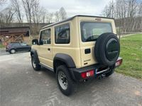 gebraucht Suzuki Jimny - beige-metallic - 8fach bereift -25.000km