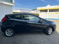 Używany Ford Fiesta Titanium 97 KM (71 kW) 2012 Czarny Sedan/Limuzyna