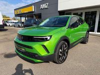 Gebraucht Opel Mokka Elegance 131 PS (96 kW) 2024 Lackierung matcha green/typ au SUV