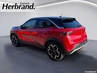 Gebraucht Opel Mokka-e Ultimate 100 kW (136 PS) 2021 Power rot/kosmos rot SUV