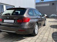 Gebraucht BMW 320 Comfort Edition 184 PS (135 kW) 2013 Havanna metallic Kombi