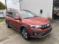 Neu Dacia Jogger Expression 91 PS (66 kW) 2025 Braun Van / Kleinbus