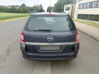 Używany Opel Astra 90 KM (66 kW) 2009 Szary Kombi