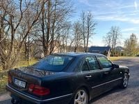 Second-hand Mercedes E250 150 CP (110 kW) 1998 Negru Berlinǎ