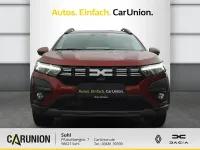 Gebraucht Dacia Jogger Extreme 91 PS (66 kW) 2025 Terracottabraun metallic Van / Kleinbus