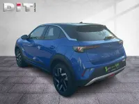 Gebraucht Opel Mokka Elegance 131 PS (96 kW) 2023 Perl blau/voltaik blau (metallic) SUV