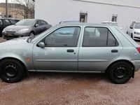 Gebraucht Ford Fiesta Ghia 75 PS (55 kW) 2001 Aquarius metallic Kleinwagen