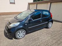 Gebraucht Peugeot 107 68 PS (50 kW) 2011 Schwarz Kleinwagen