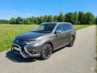 Gebraucht Mitsubishi Outlander P-HEV Plus 121 PS (88 kW) 2016 Braun Kombi