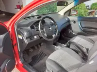 Gebraucht Chevrolet Aveo 85 PS (62 kW) 2010 Rot Limousine