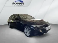 Gebraucht BMW 320e 204 PS (150 kW) 2023 Schwarz Kombi
