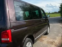 Używany VW Multivan 114 KM (83 kW) 2013 Purpurowy Minivan