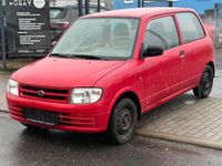 Gebraucht Daihatsu Cuore 56 PS (41 kW) 2000 Rot Kleinwagen