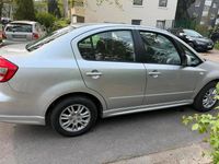 Usado Suzuki SX4 105 HP (77 kW) 2010 Prateado Sedan